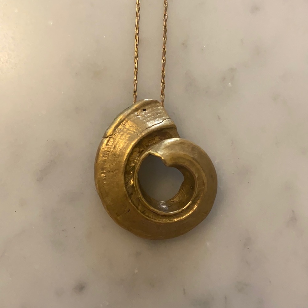 Necklace with shell pendent